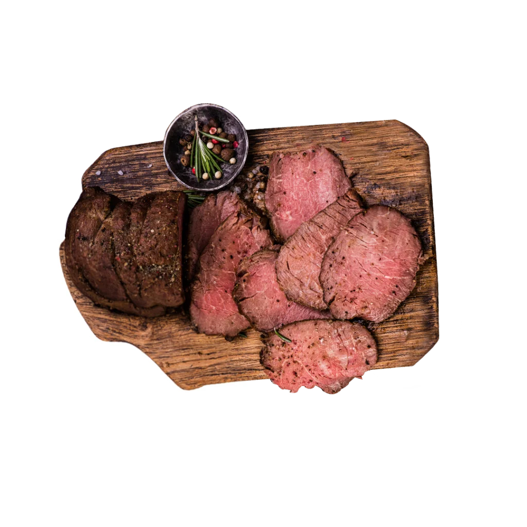 Slices of Roast Beef on a serving board. 